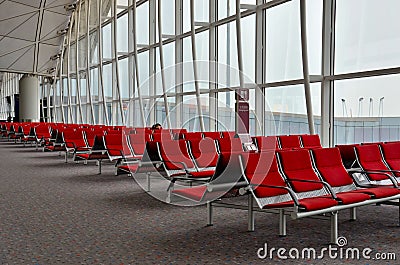 Woman traveler sleeps at Hong Kong Airport