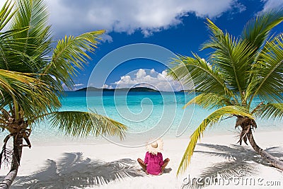 Woman tropical beach palm trees