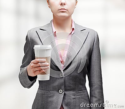 woman with a tumbler of coffee