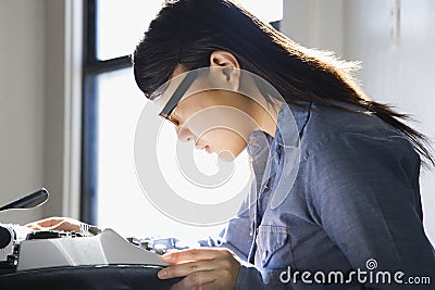 Woman with typewriter.