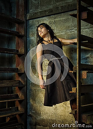 Woman on urban stairs