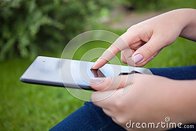 Woman using digital tablet PC