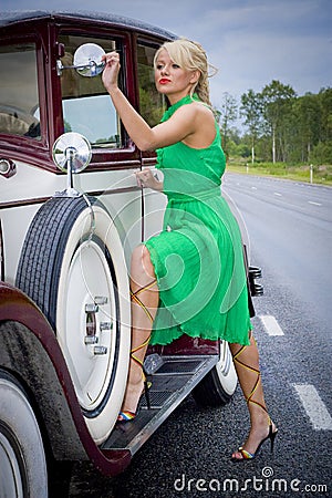 Woman and vintage car