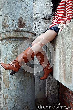 Woman wearing leather boots