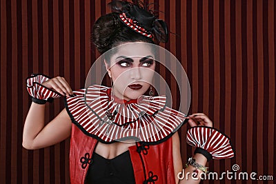 Woman Wearing Striped Fashion With Dramatic Lighting