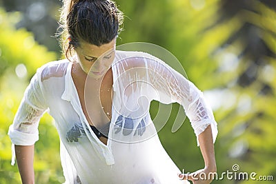 Woman in wet shirt