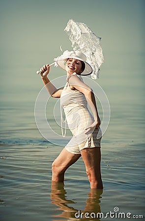 Woman with white umbrella
