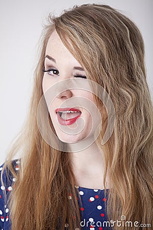 Woman winking with one eye