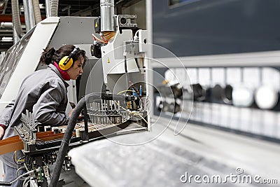 Woman working in automated factory