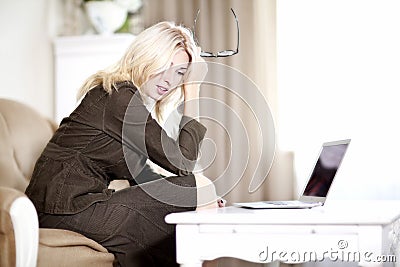 Woman working in her laptop