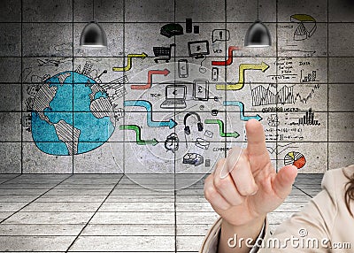 Womans hand pointing against wall background showing global business development