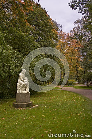 Womans Sculpture in the Autumn old St.Peterburg s Park