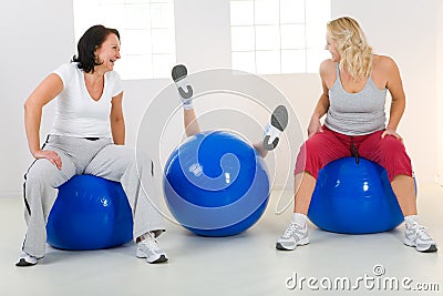 Women on fitness balls