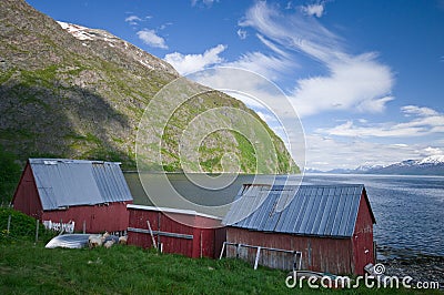 Wood cabins and fjord