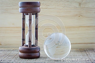 Wood hourglass countdown start the Earth