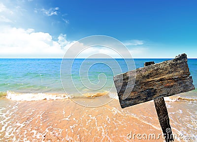 Wood sign on beach