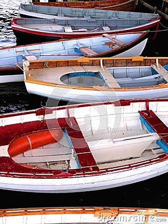 Hand-made Wooden Boats with colourful paint, in Tasmania, Australia.