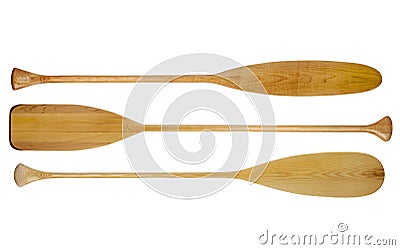 Three wooden canoe paddles with different shape of blades including 