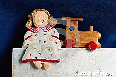 Wooden doll and train