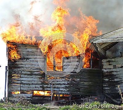 Wooden house on fire