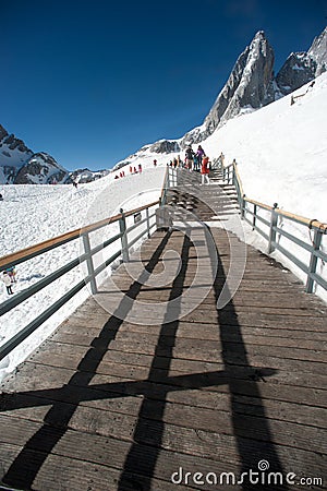 Wooden stair on Jade dragon snow mountain,China.