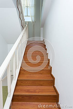 Wooden staircase made from laminate wood