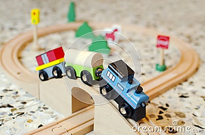 Wooden toy train on wood tracks