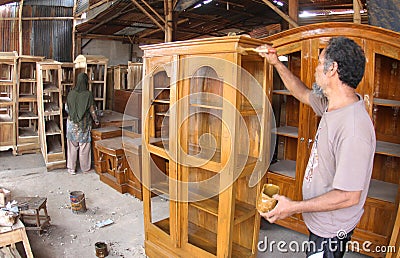 Woodworker making furniture