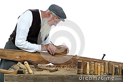 Small woodworking by a carpenter in his workshop.