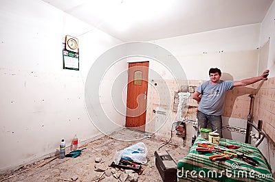 Worker in room renovation