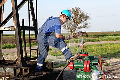 Worker with wrench check pipeline