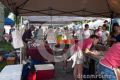 Workers and Shoppers at Outdoor Farmer�s Market
