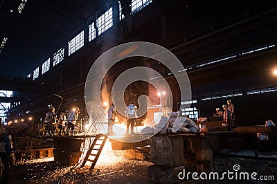 Workers in a Steel Factory