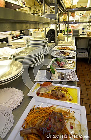 Working restaurant kitchen with food