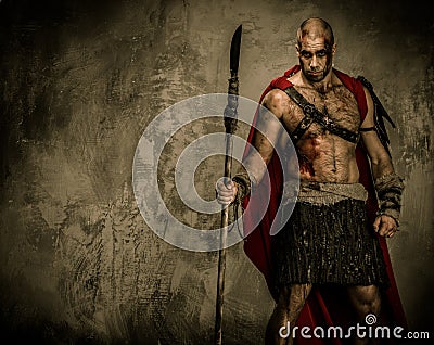 Wounded gladiator holding spear