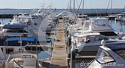 Yacht or motor boat moored at marina. Nelson Bay.