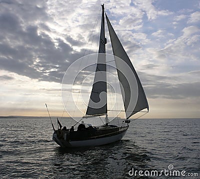 Yacht is sailing in the evening