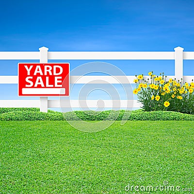 Yard sale sign and fence