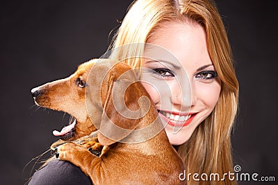 Yawning Cute Dachshund And Beautiful Woman