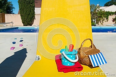 Yellow bed at swimming pool