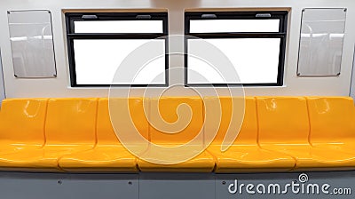 Yellow chair and windows in electric train