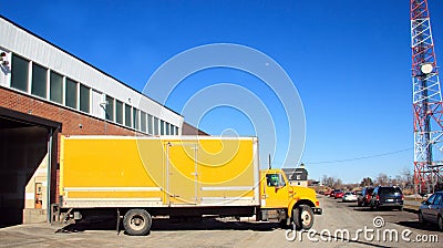 Yellow delivery truck