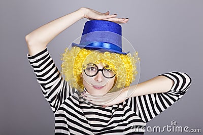 Yellow-haired girl in blue cap