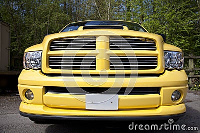 Yellow pick up truck