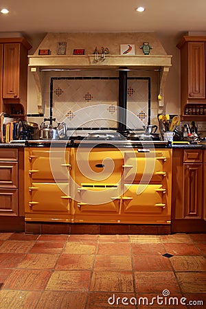 Yellow range oven in a lovely kitchen.