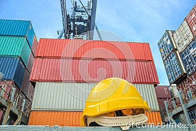 Yellow safety helmet on container ship