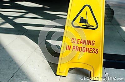 Yellow signboard shows cleaning in progress