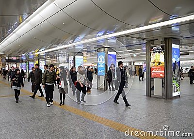 Yokohama, Japan - November 27: people who cross train station in