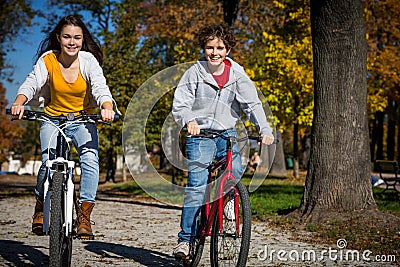 Young active people biking