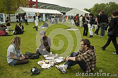Young Adults Picnicking in Park, Paris, France